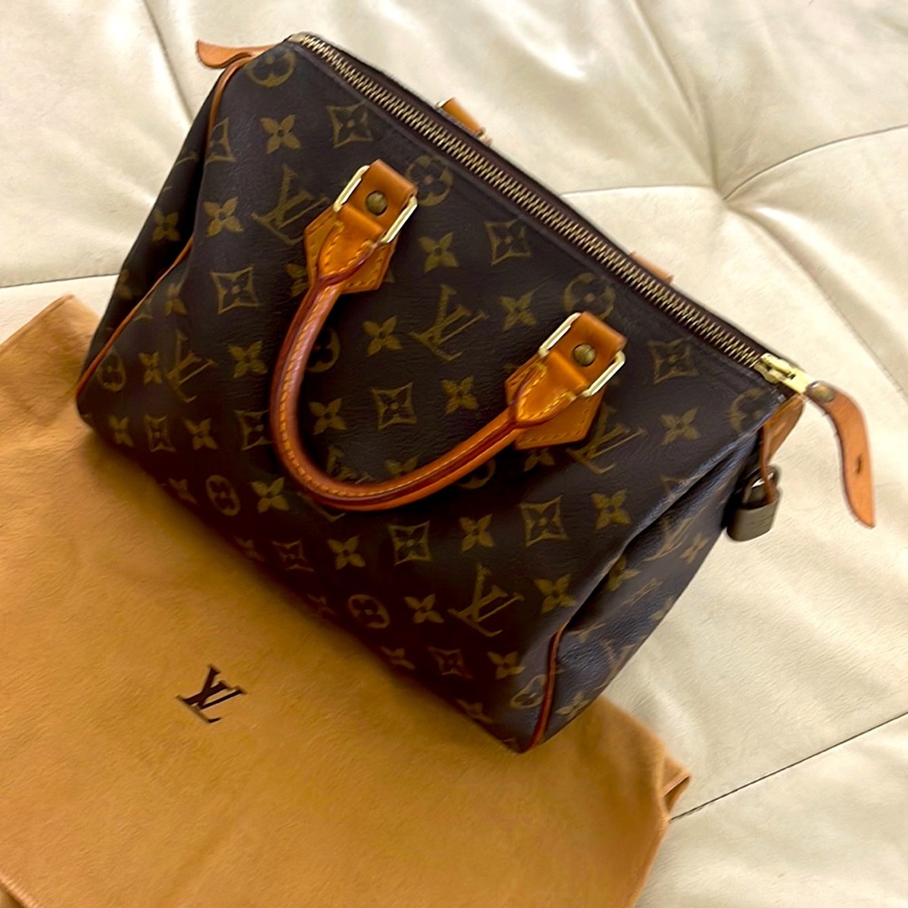 Louis Vuitton
Monogram Speedy 25” Vintage Bag